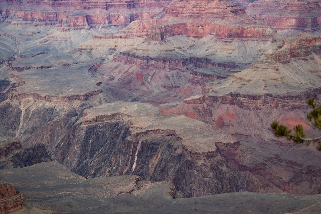 A breathtaking view of the Grand Canyon's colorful layered rock formations.