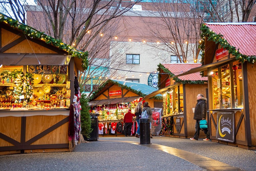 Vendor chalets at the Pittsburgh Christmas market during the day